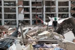 Reportan dos personas con posible vida en un edificio de Venezuela